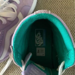 Vans shoes girls size 1 soles never touched the ground. Very beautiful suede.